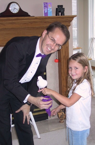 Richard Young the Magician and the birthday girl from Calgary, Alberta, Canada